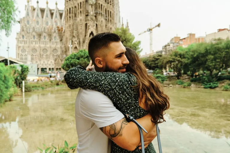 Happy bride-to-be reacting with joy during her engagement session at the Sagrada Família.