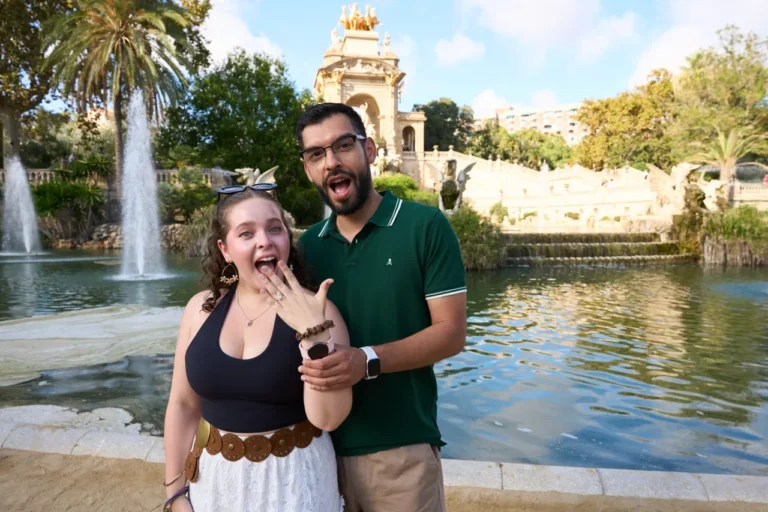 Happy bride-to-be reacting with surprise during her engagement session at Ciutadella Park.