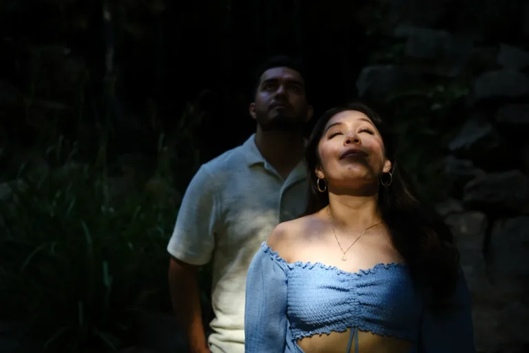 Dramatic sunlight and shadows on a couple during an engagement shoot in the Horta gardens.
