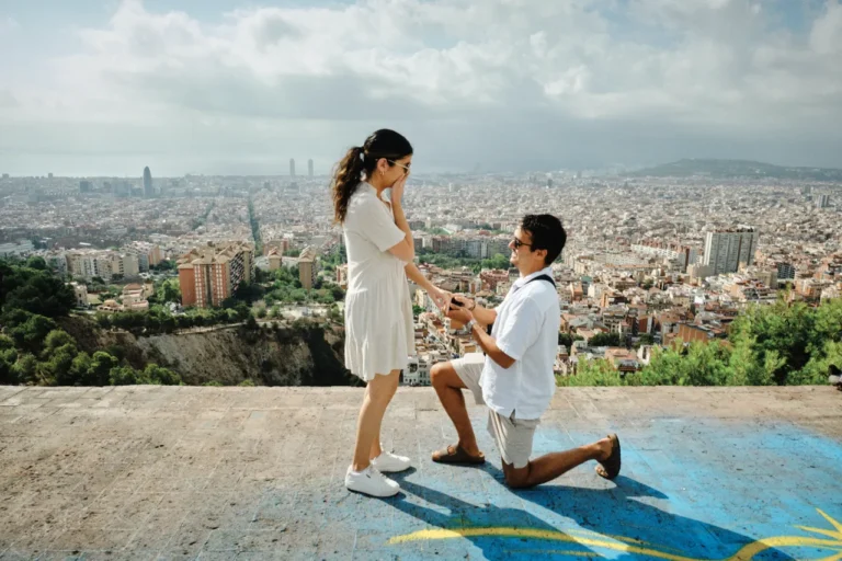 Candid reaction to a romantic rooftop-style proposal at the Bunkers del Carmel lookout.