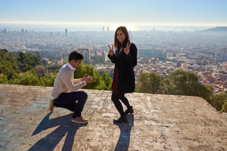 Man kneeling for a surprise proposal during the golden hour at Bunkers del Carmel.