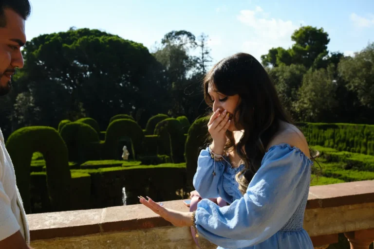 Surprise emotional reaction during a marriage proposal at the Horta Labyrinth Park.