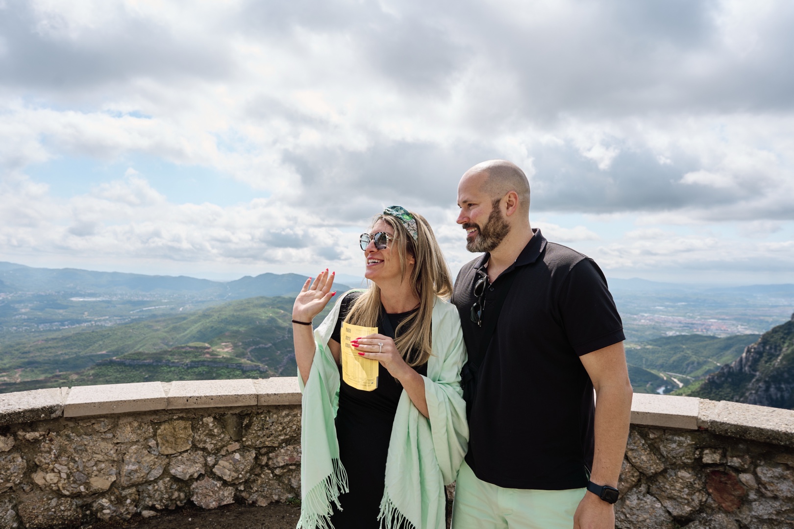Couple celebrating engagement proposal at montserrat viewpoint