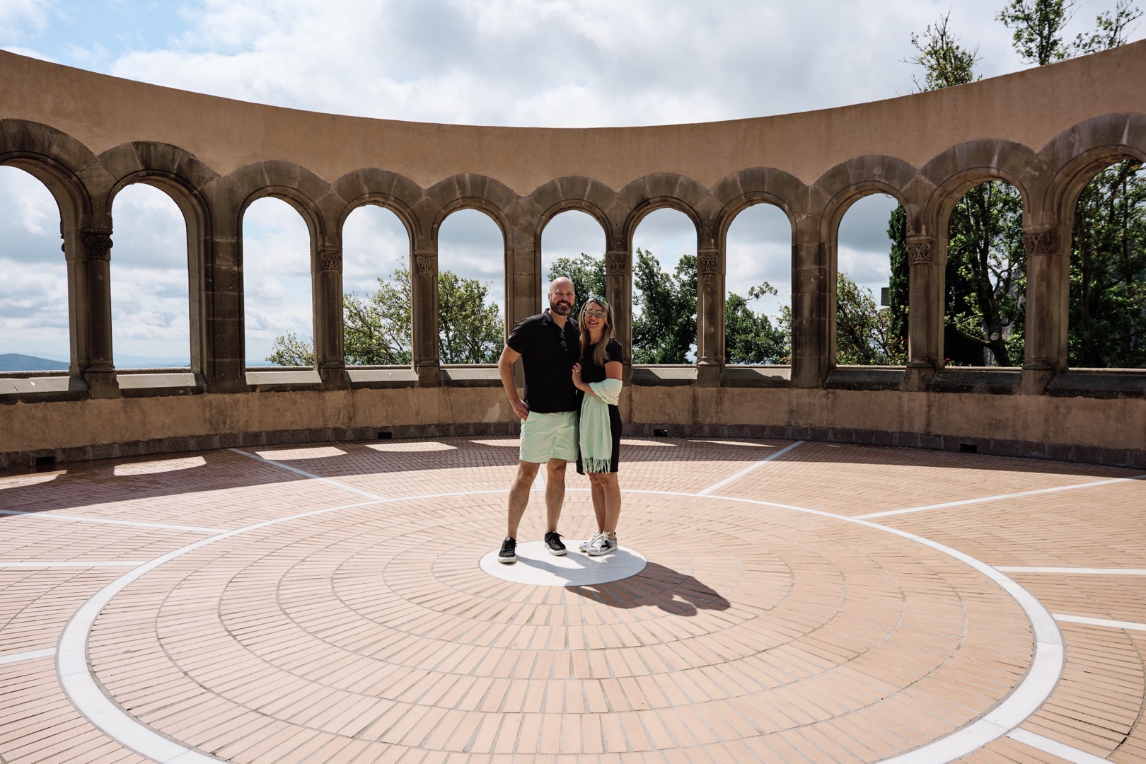 Couple posing for proposal at montserrat arches