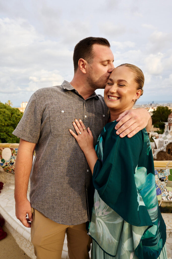 Barcelona proposal photographer’s portrait of the newly engaged couple at Park Güell